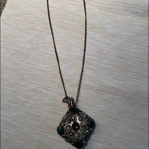 Vintage mid eastern scent bottle pendant.